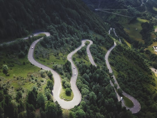 aerial photography of winding road in the mountain in 65170 Aragnouet France