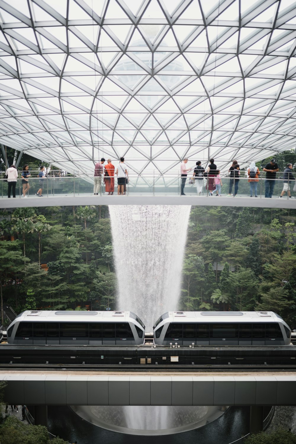 people inside airport's fountain