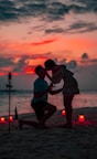 couple kissing on shore