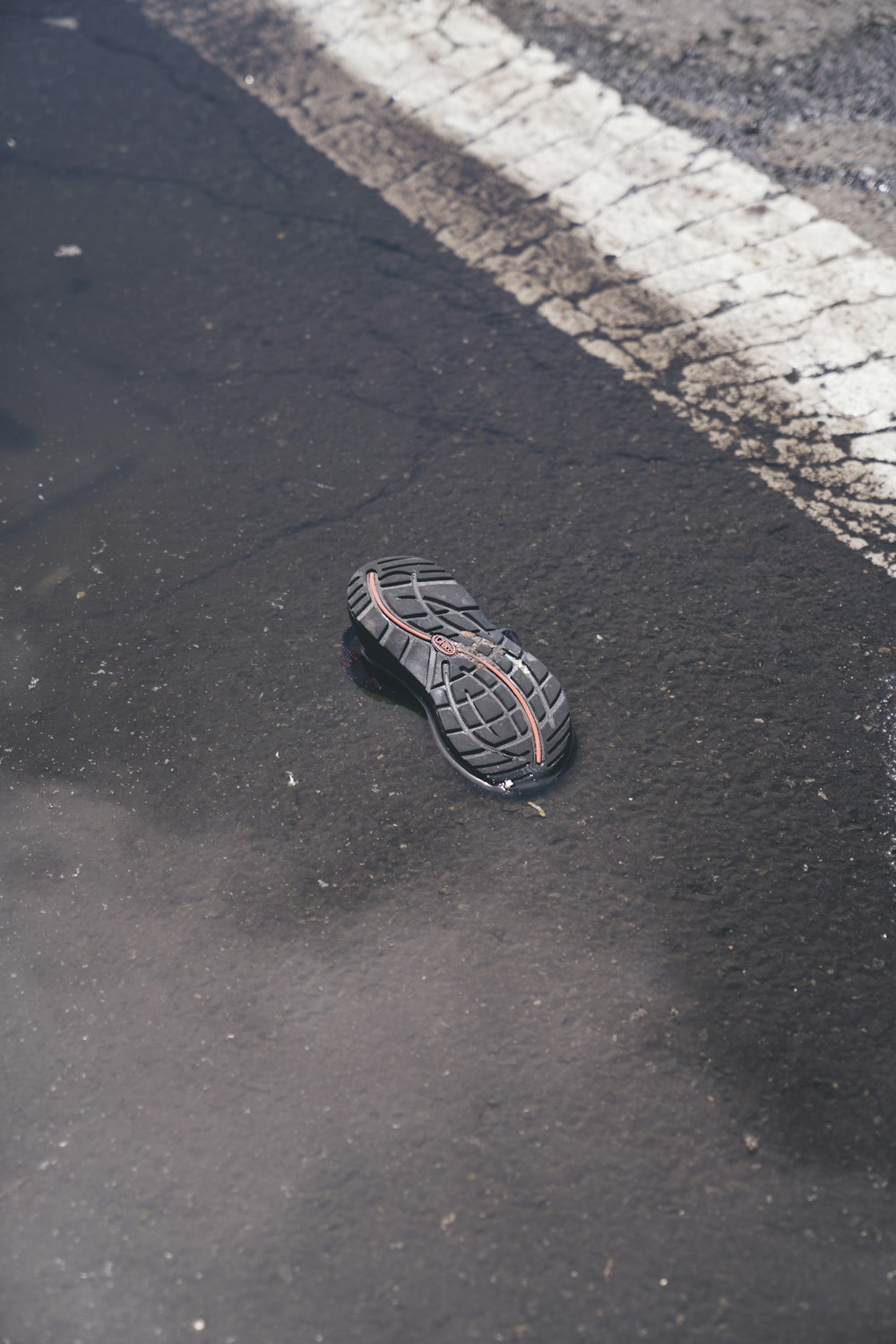 black shoe floating in water