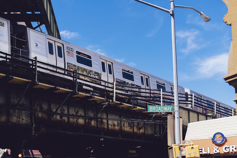 gray train under a calm blue sky