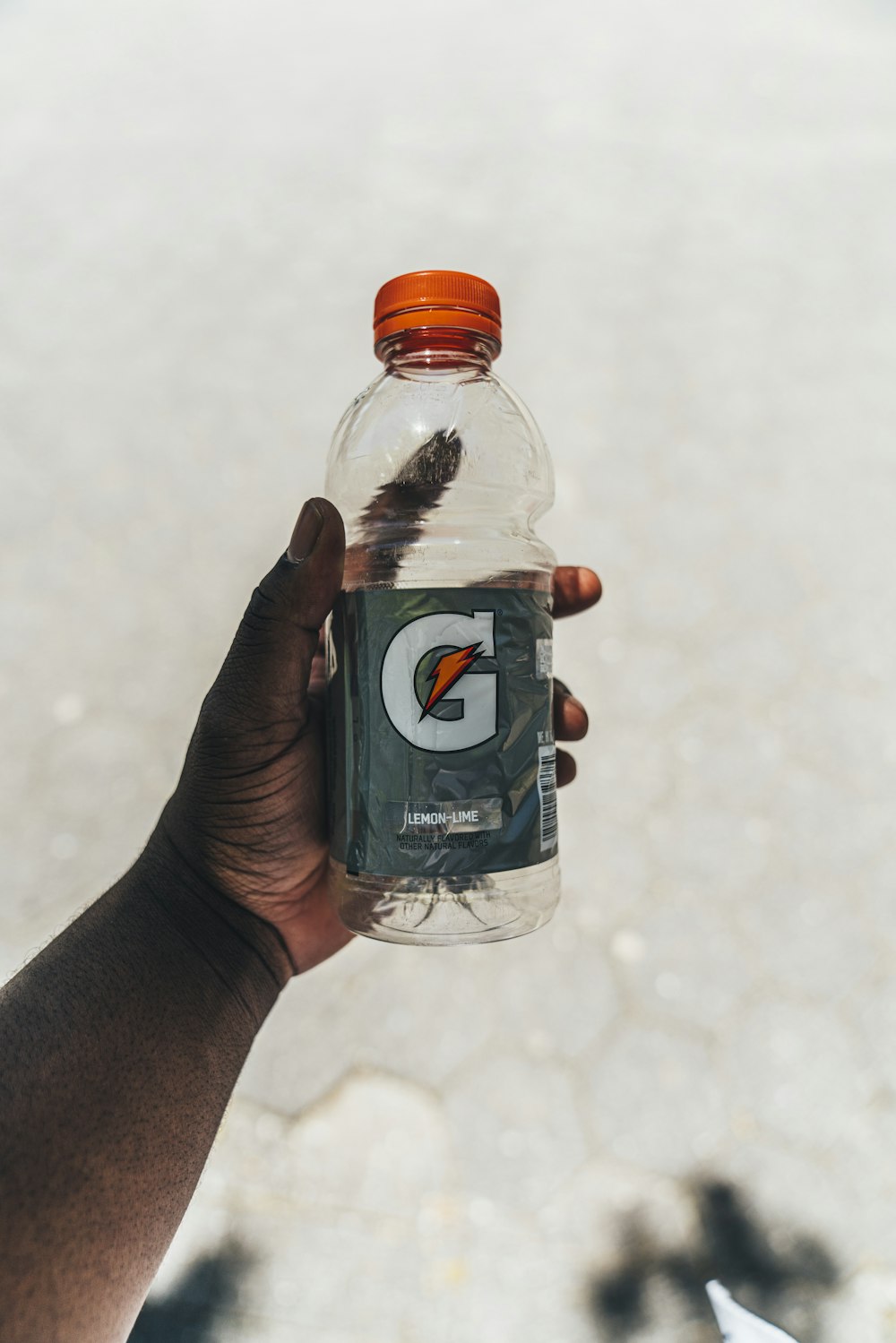 shallow focus photo of Gatorade energy drink bottle
