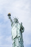 shallow focus photo of Statue of Liberty