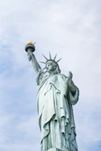 shallow focus photo of Statue of Liberty