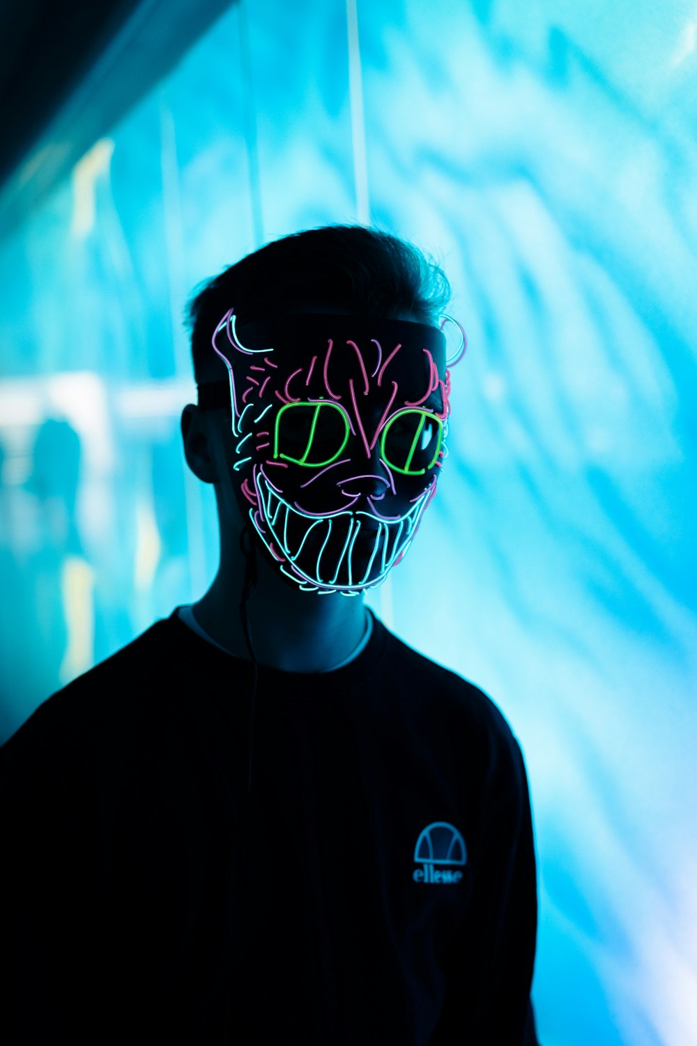 Download Man Wearing Green And Red Cat Neon Mask Photo Free Light Image On Unsplash PSD Mockup Templates