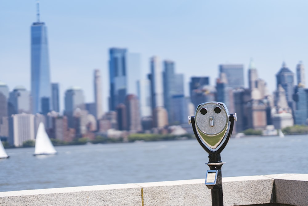 a parking meter with a face painted on it