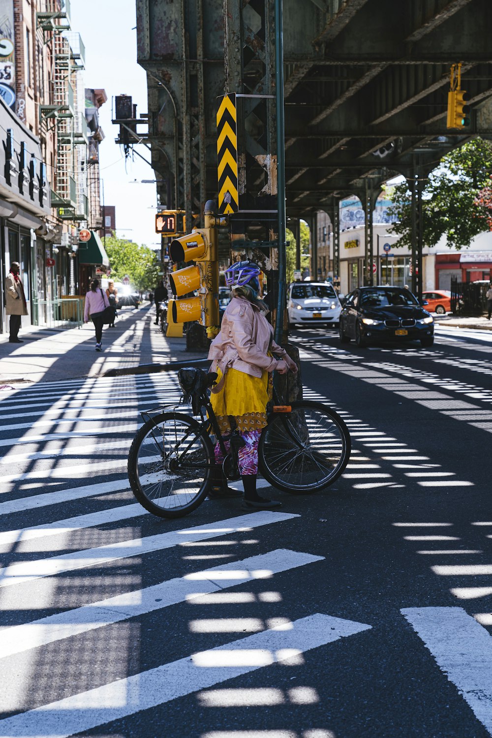 woman riding bicycle in the street
