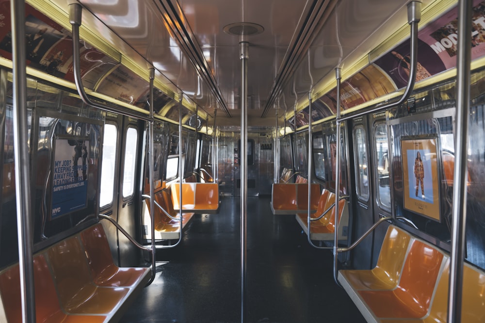 landscape photography of train with empty seats