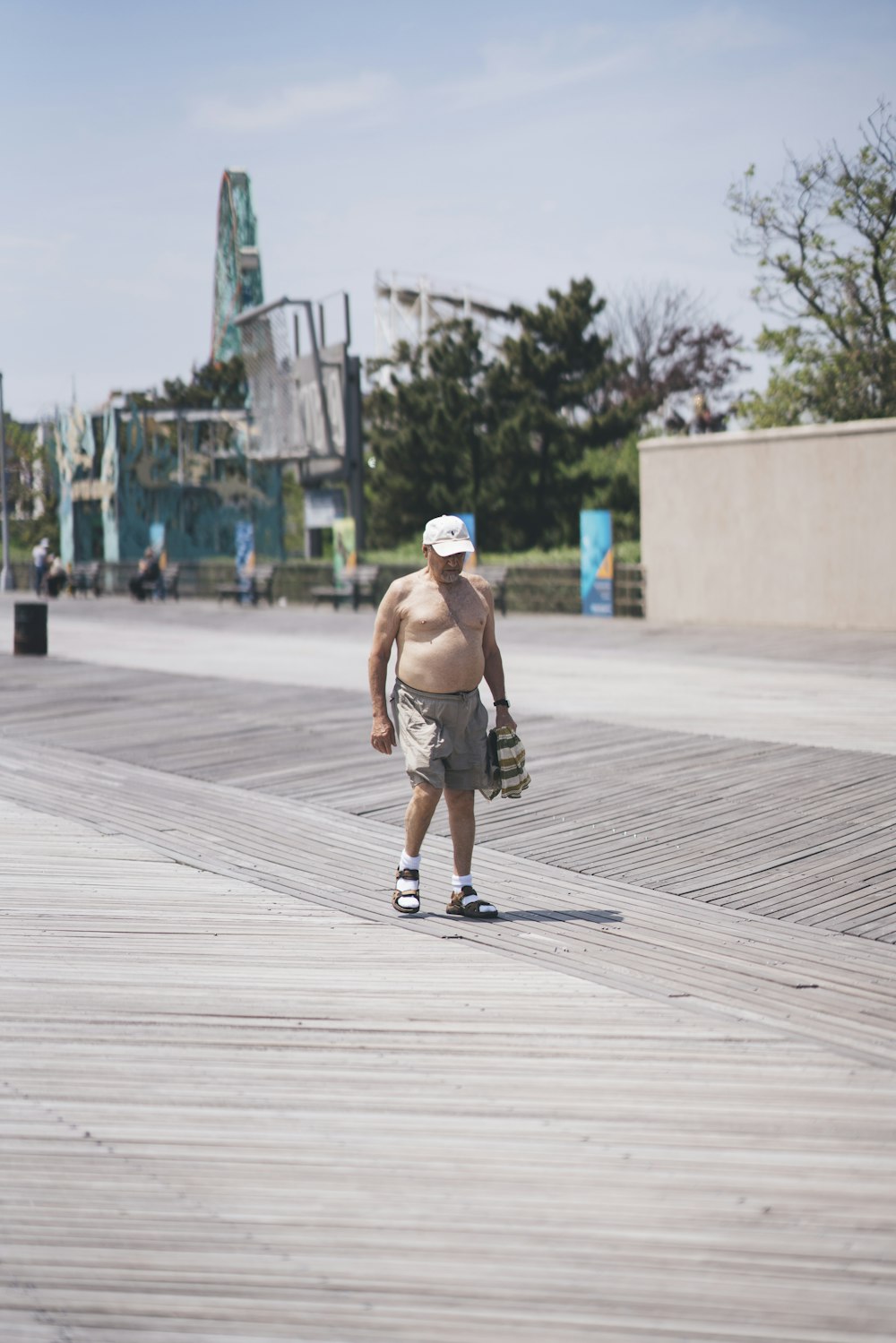 man walking on sidewalk