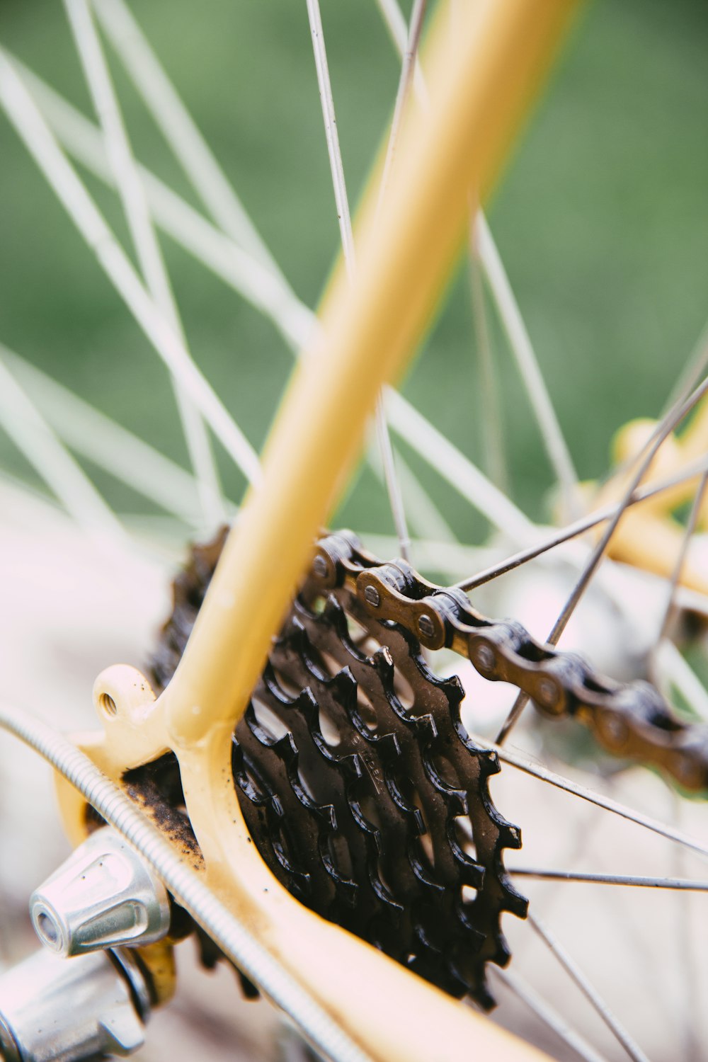 a close up of the spokes of a bicycle