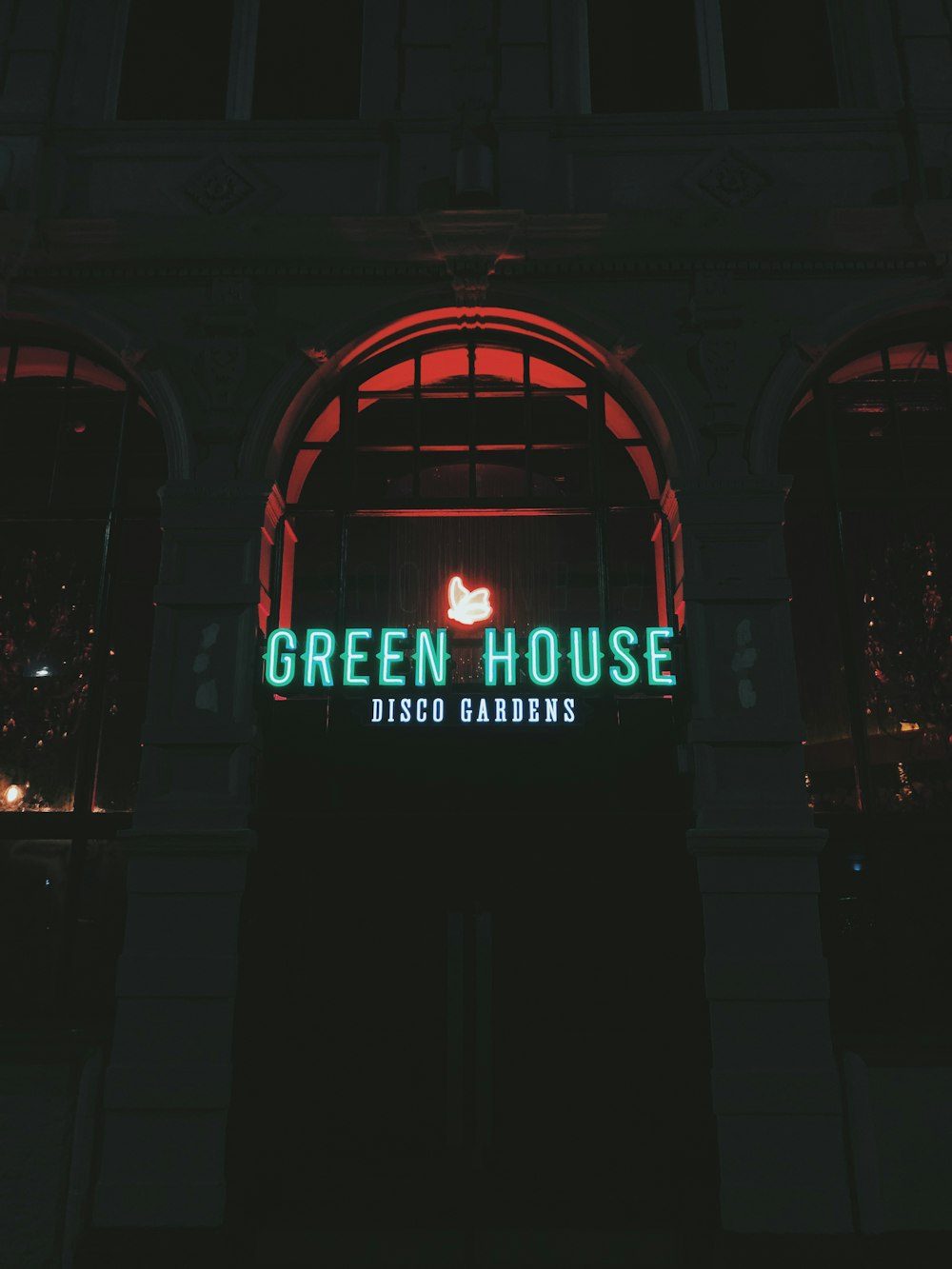 Green House disco gardens sign during night time