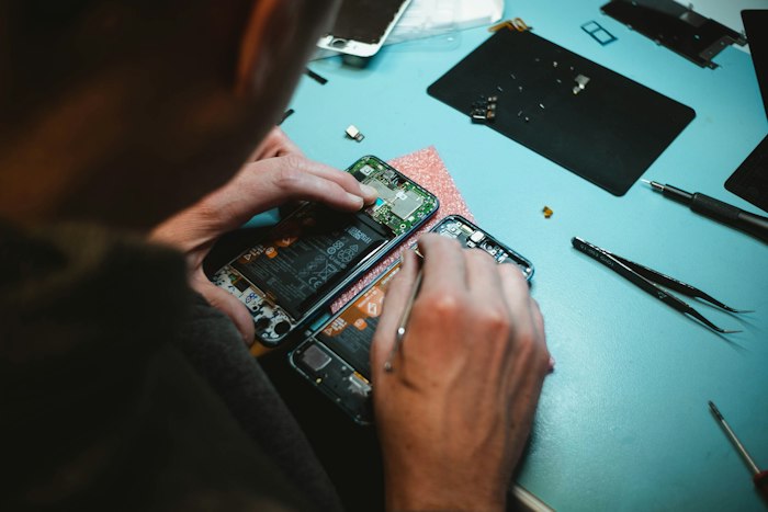 Computer technician working on repair