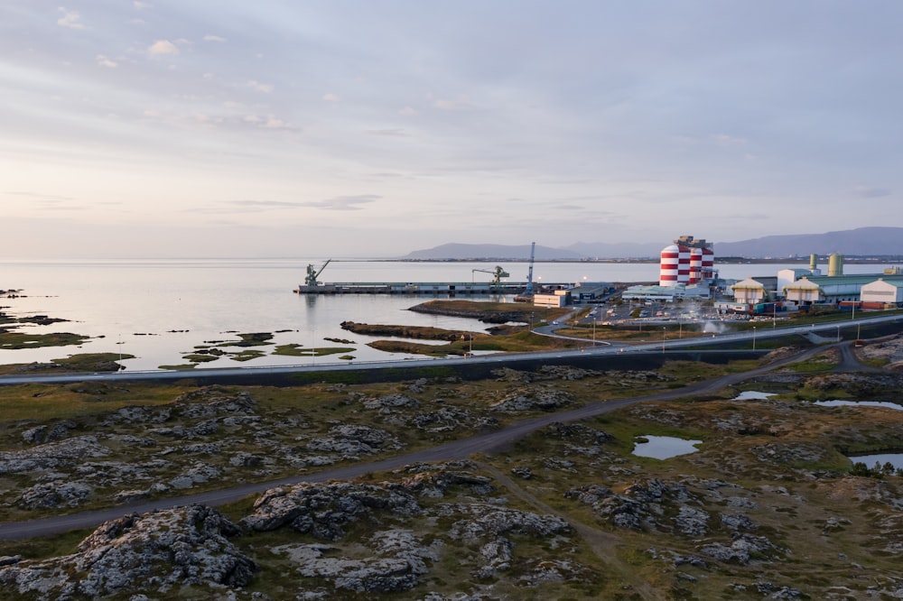 a large body of water next to a small town