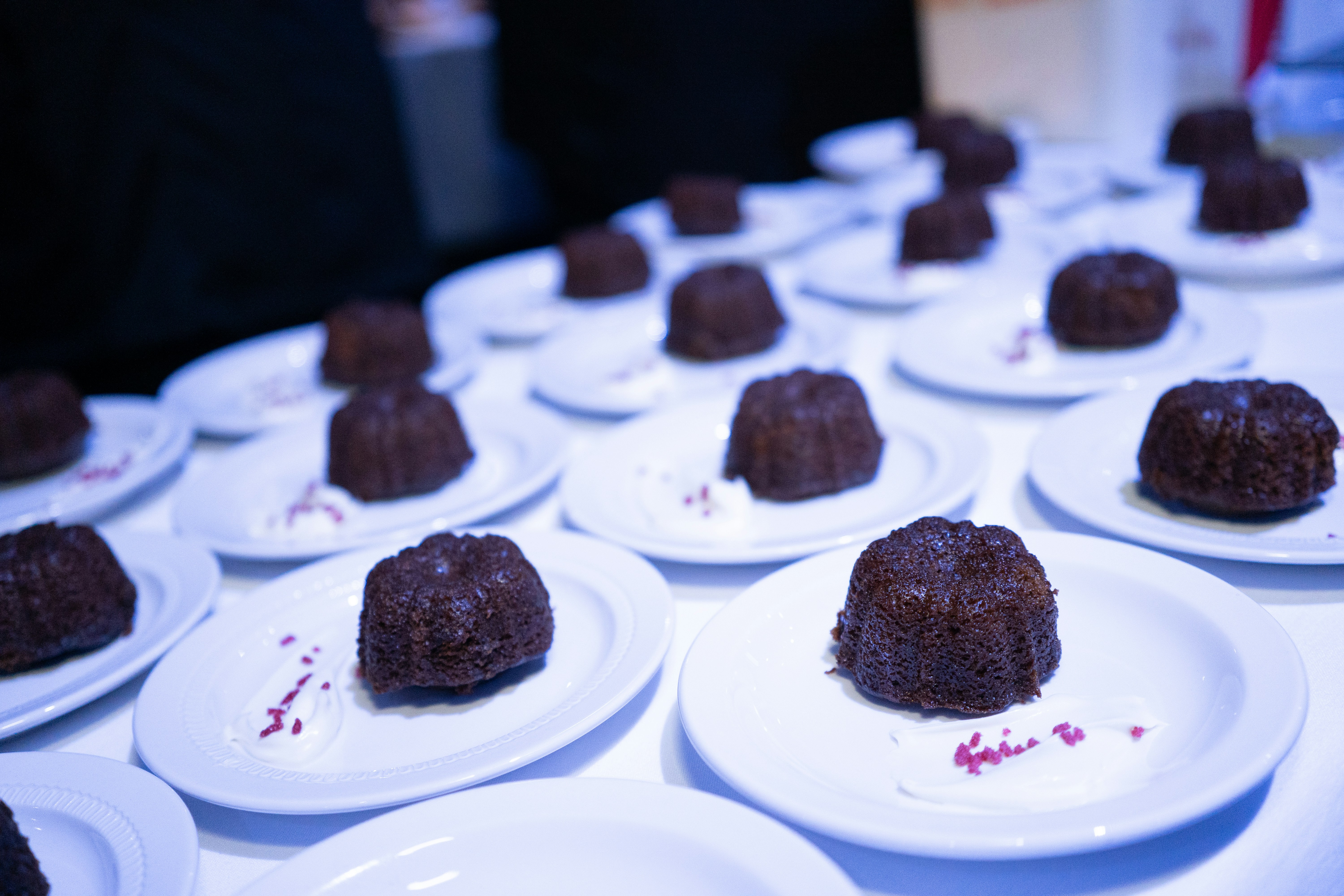 pastry on saucers at table top