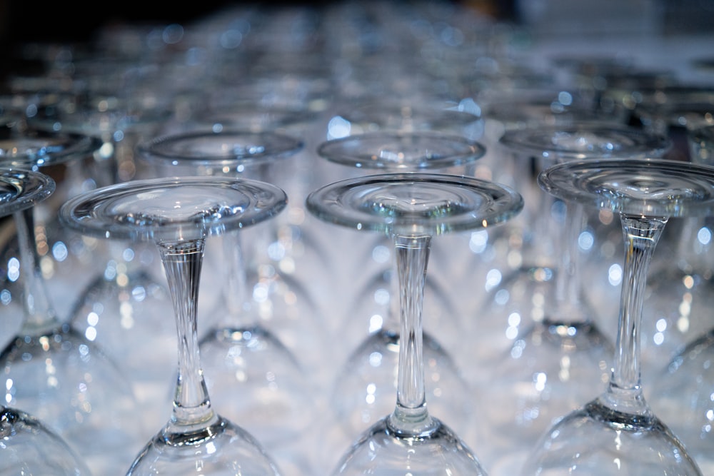 macro photography of clear long-stem wine glasses