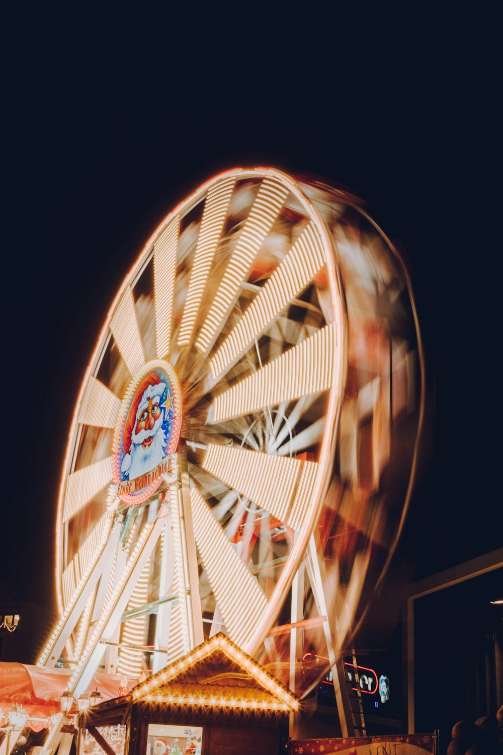 brown and orange Ferris wheel during night time