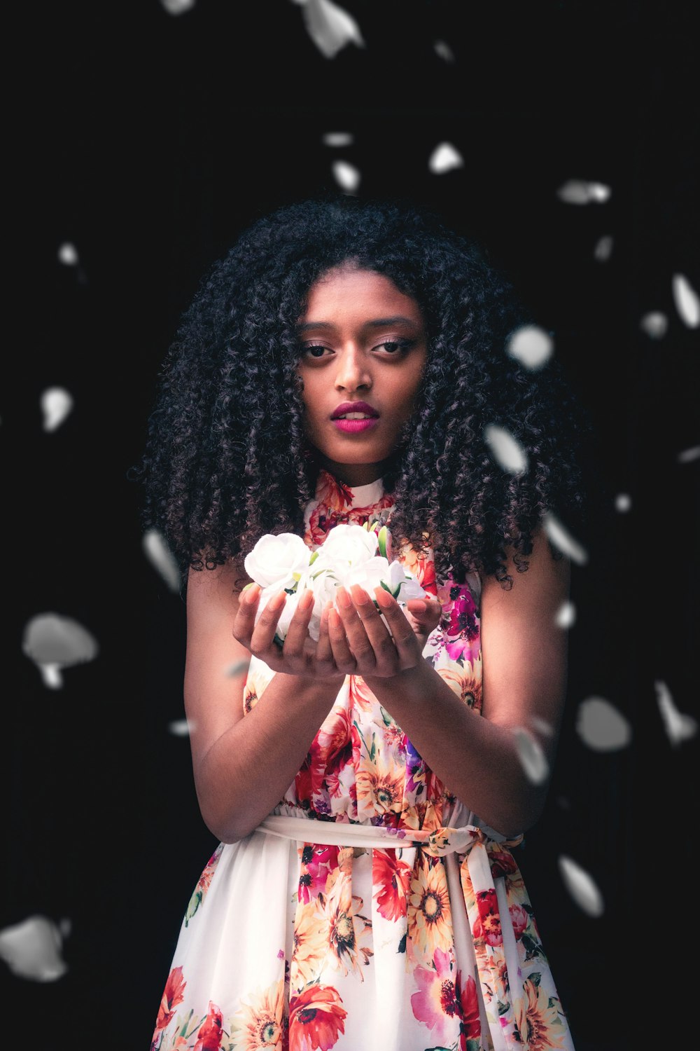 woman wearing red and white floral dress