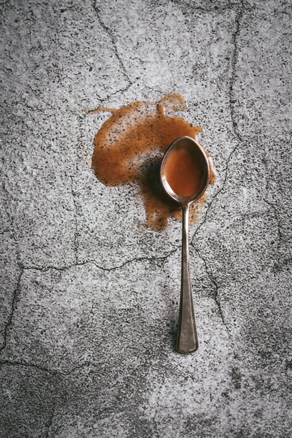 spoon on grey surface