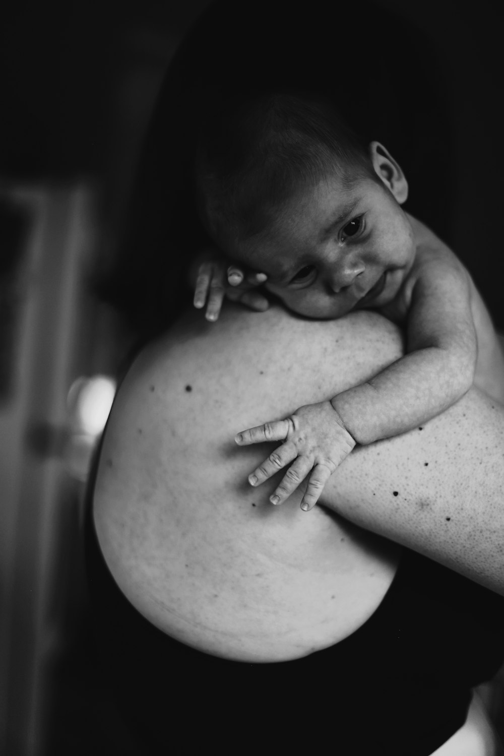 woman holding baby