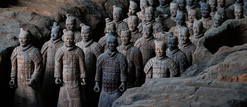 shallow focus photo of terracotta army