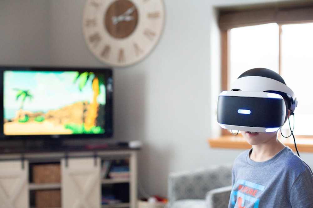 shallow focus photo of person using white VR headset