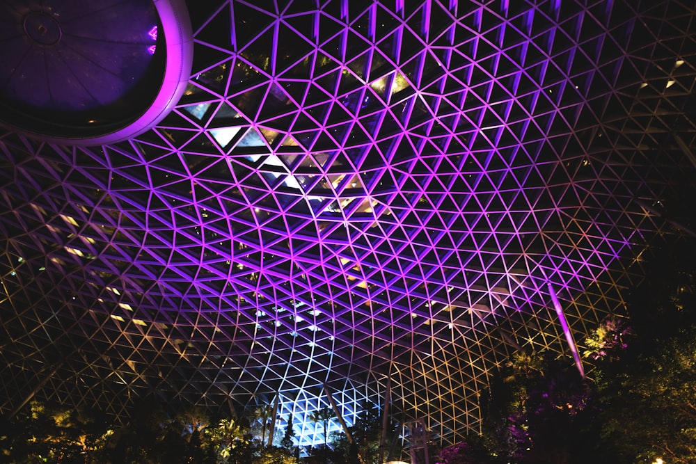 low angle photography of purple metal ceiling