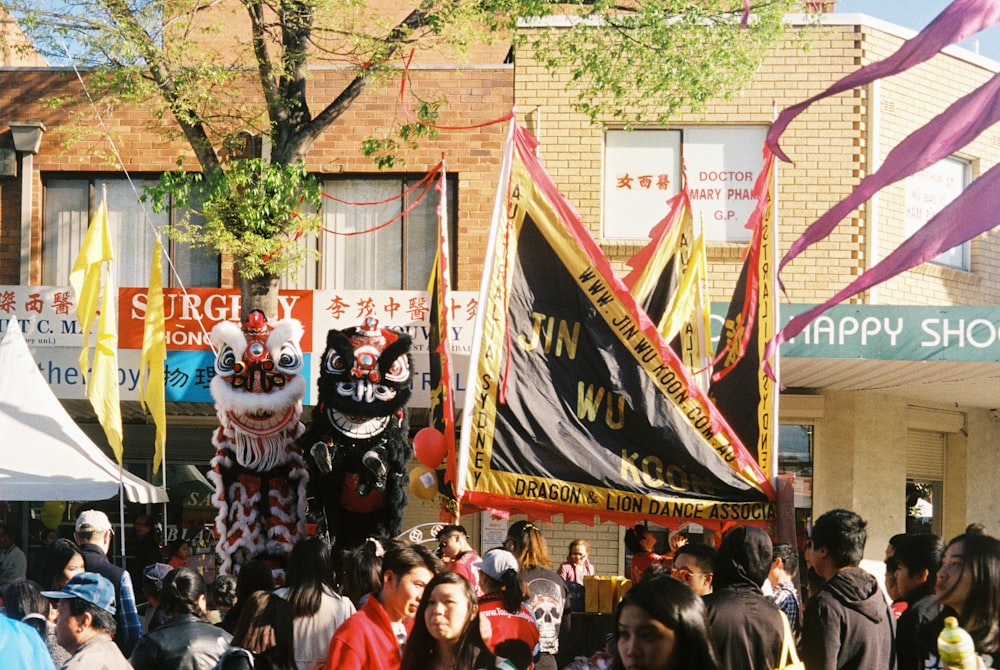 people watching parade near building