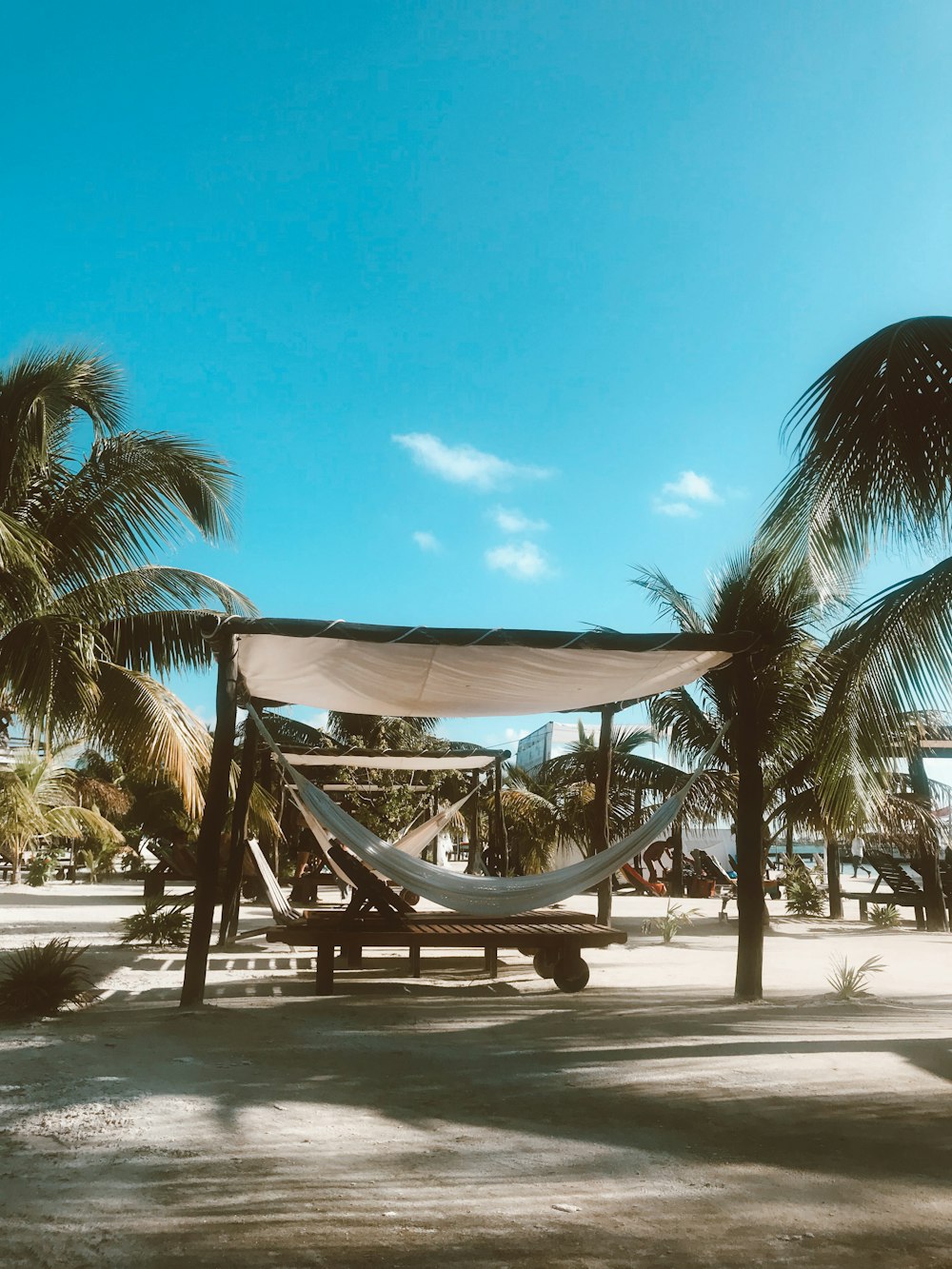 white hammock under canopy