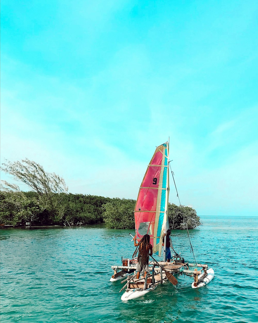 men on sailing boat