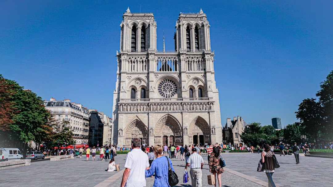 people near church building,