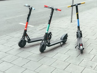 electric scooters beside street