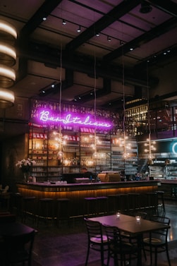 neon signage on glass wall