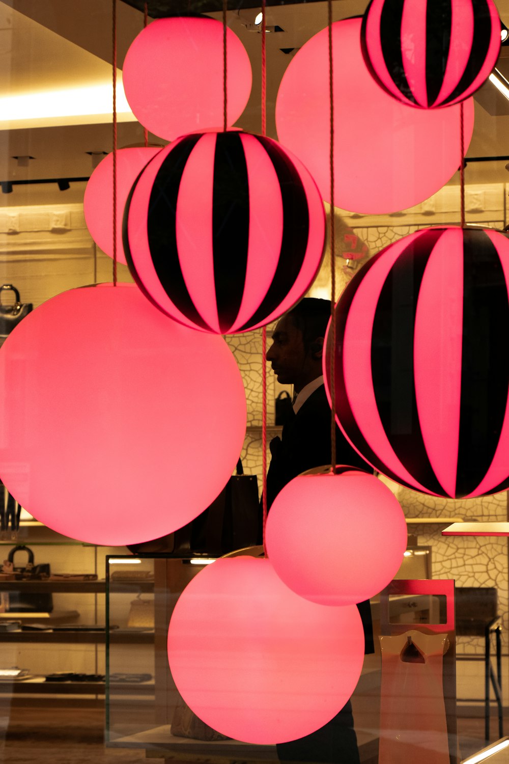 pink and black ball hanging lanterns