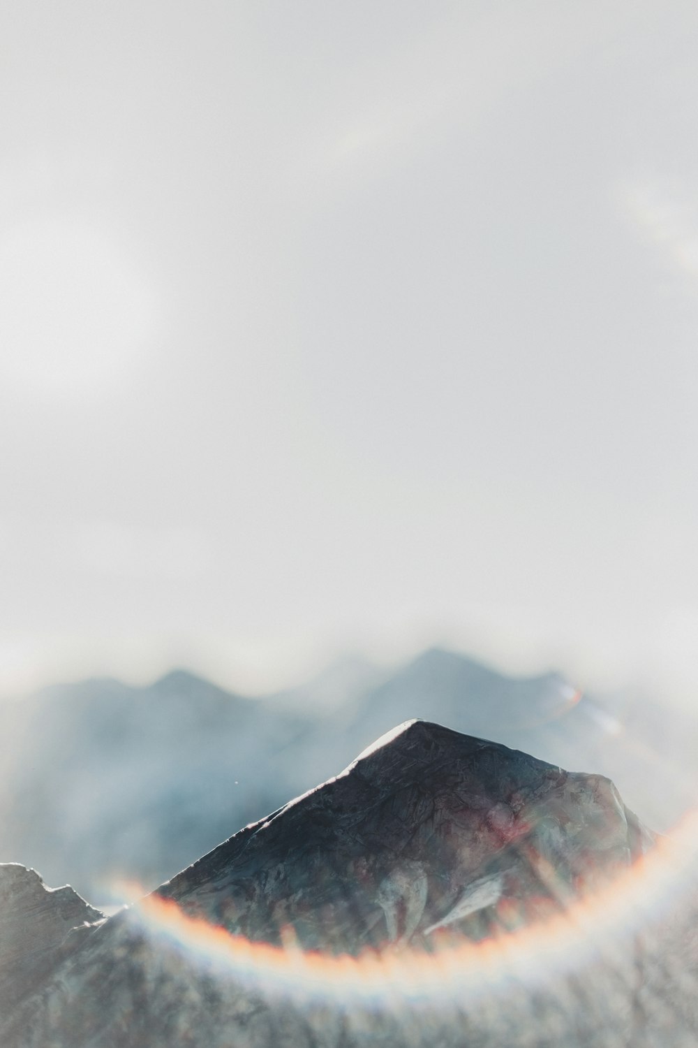 ray of light on tip of mountain