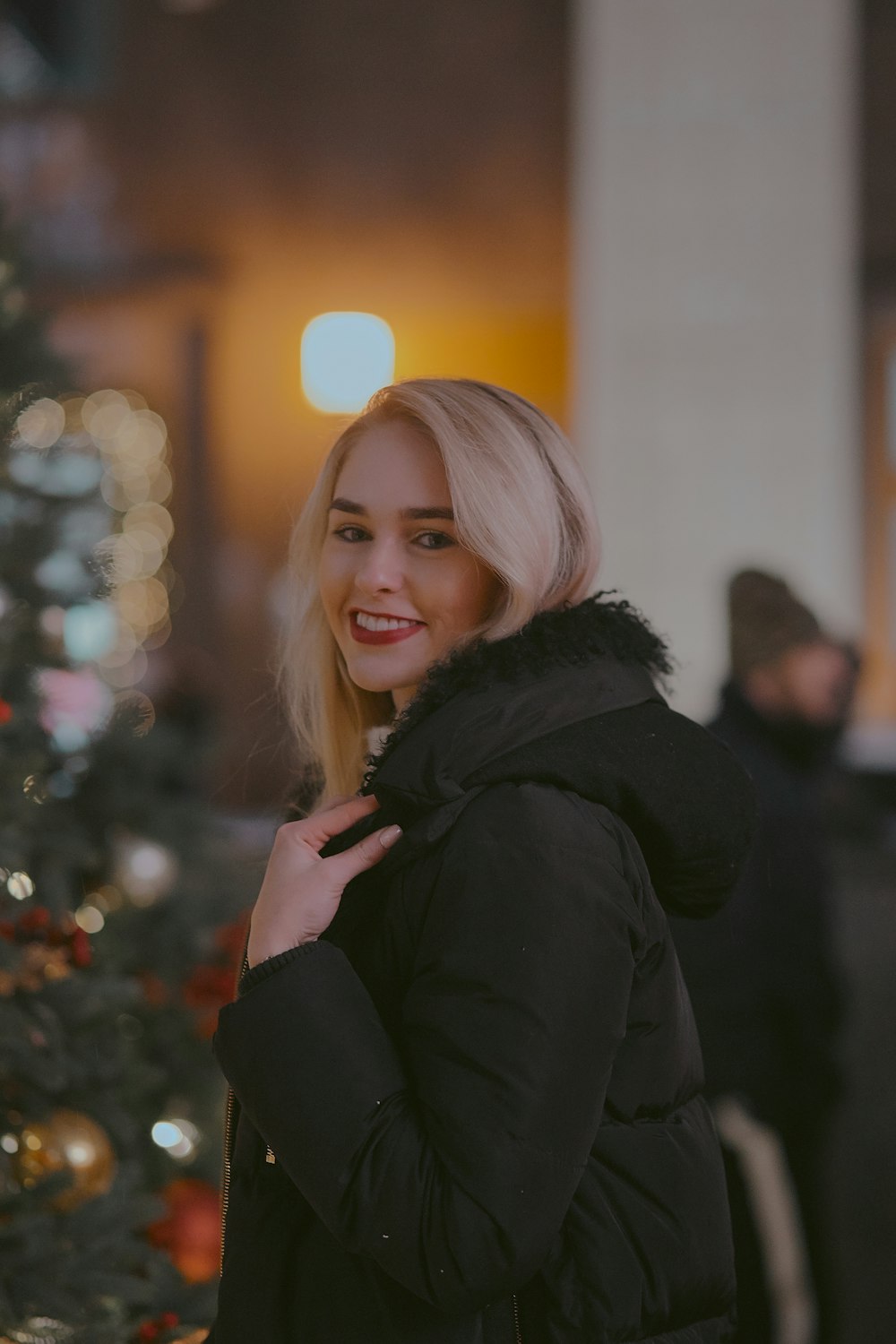 woman in black hooded jacket