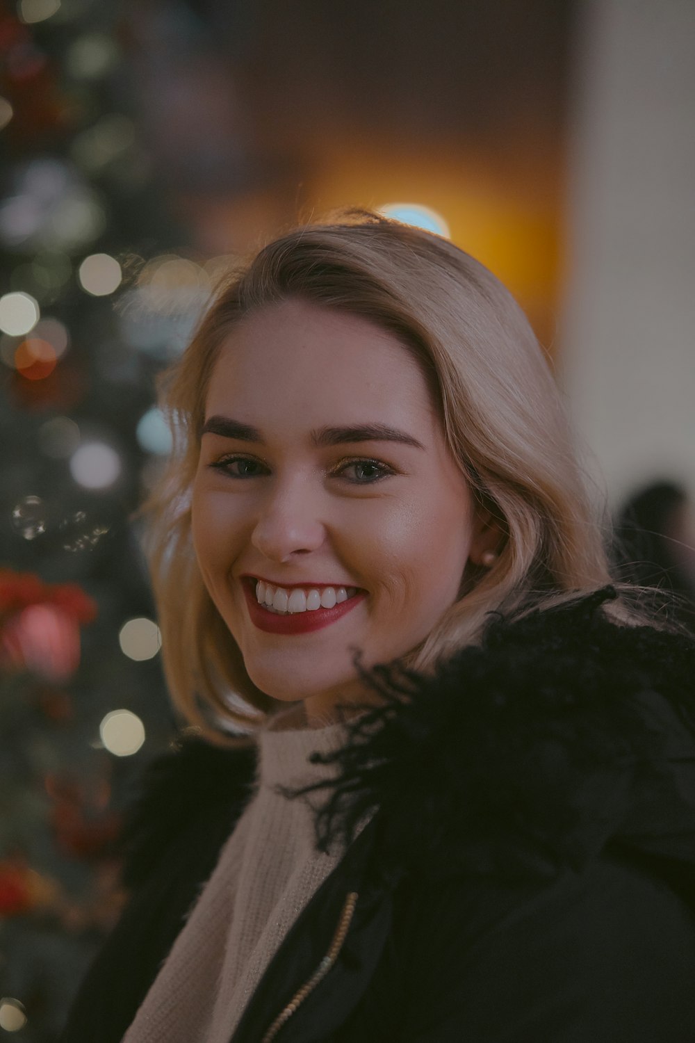 selective focus photography of smiling woman