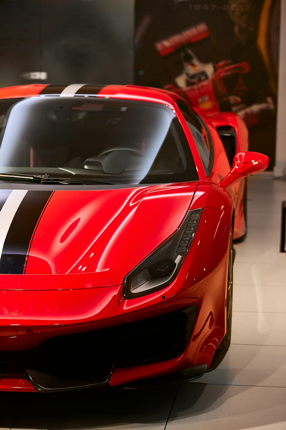 selective focus photography of red car