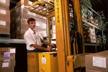 yellow driving forklift