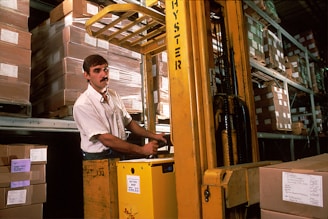 yellow driving forklift
