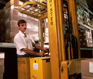 yellow driving forklift