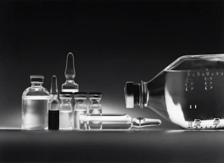 Sterile injectable peptide vials arranged neatly on a crisp white surface.
