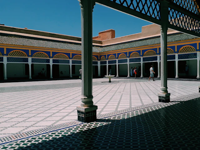 Dar Si Said's tiled courtyard with its arched blue-and-yellow gallery and central pavilion.