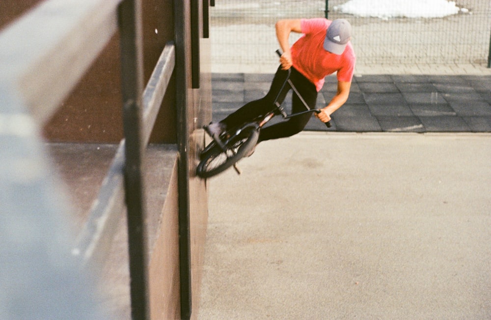 man riding on BMX bike