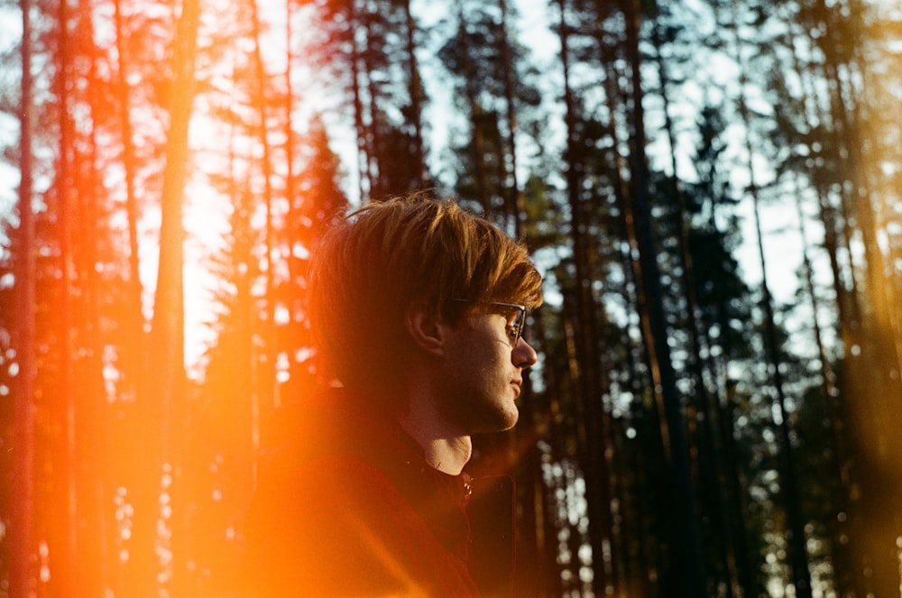 shallow focus photo of man wearing eyeglasses