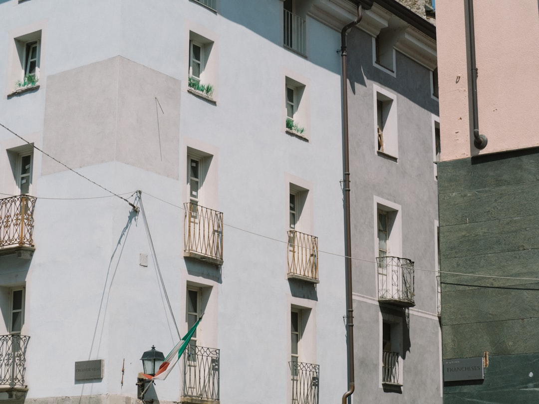 white and grey high-rise building