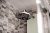 The sproos shower head options lined up: white, chrome, and matte black, each linked to purchase pages.