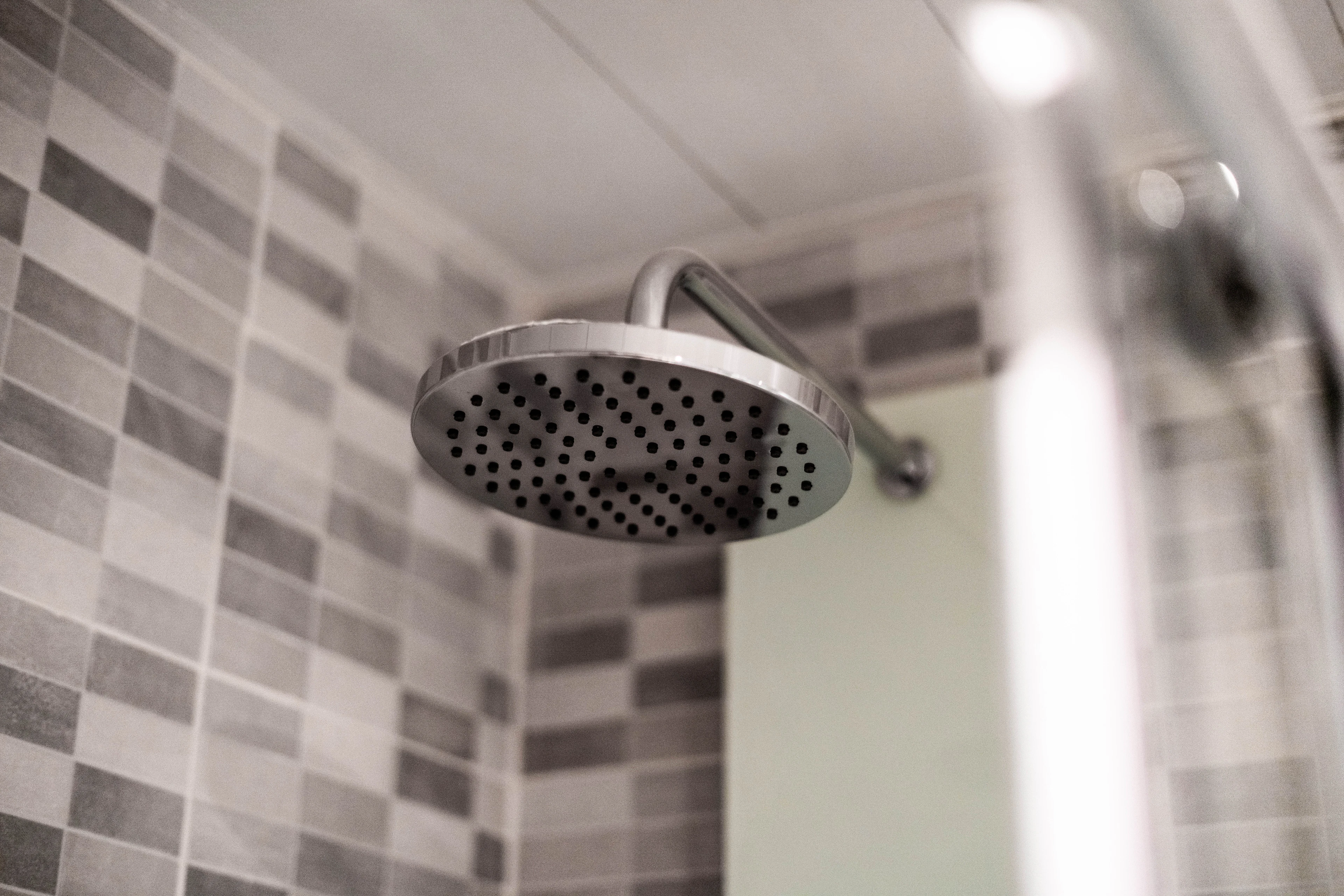 Shower head over tiles