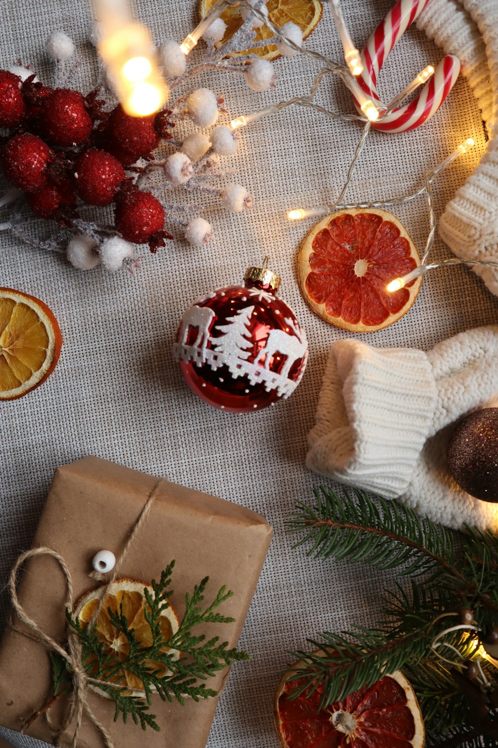 a table topped with christmas decorations and presents