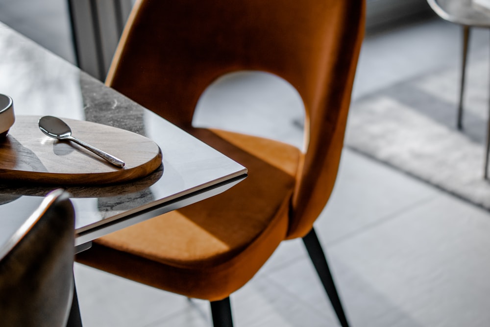 brown armless chair