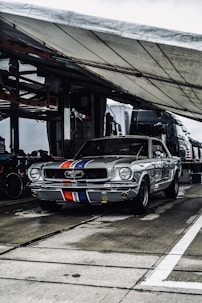 shallow focus photo of gray Ford Mustang